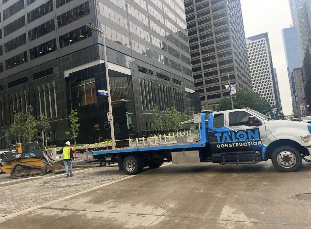 A talon construction flatbed truck