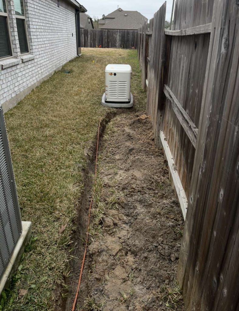 A underground utility ditch leading to a generator